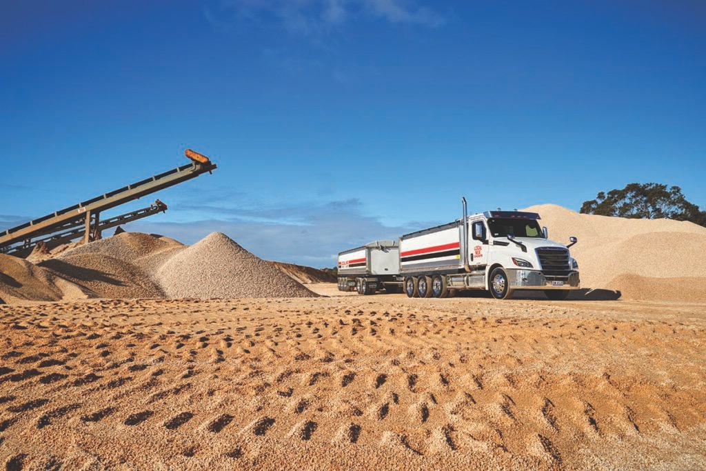 Local Mix’s innovative Freightliner 8x4 with additional lazy axle.