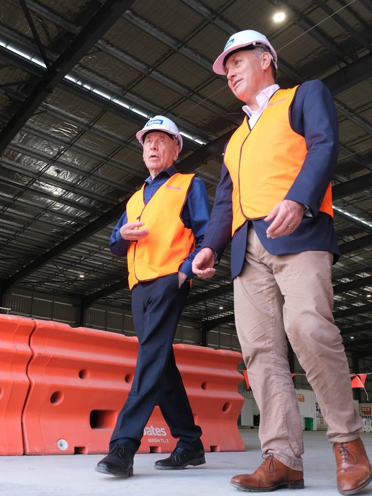 Bisinella Developments founder Lino Bisinella talks with Deputy Prime Minister Richard Marles at a warehouse facility under construction in Corio. Picture: Mark Wilson